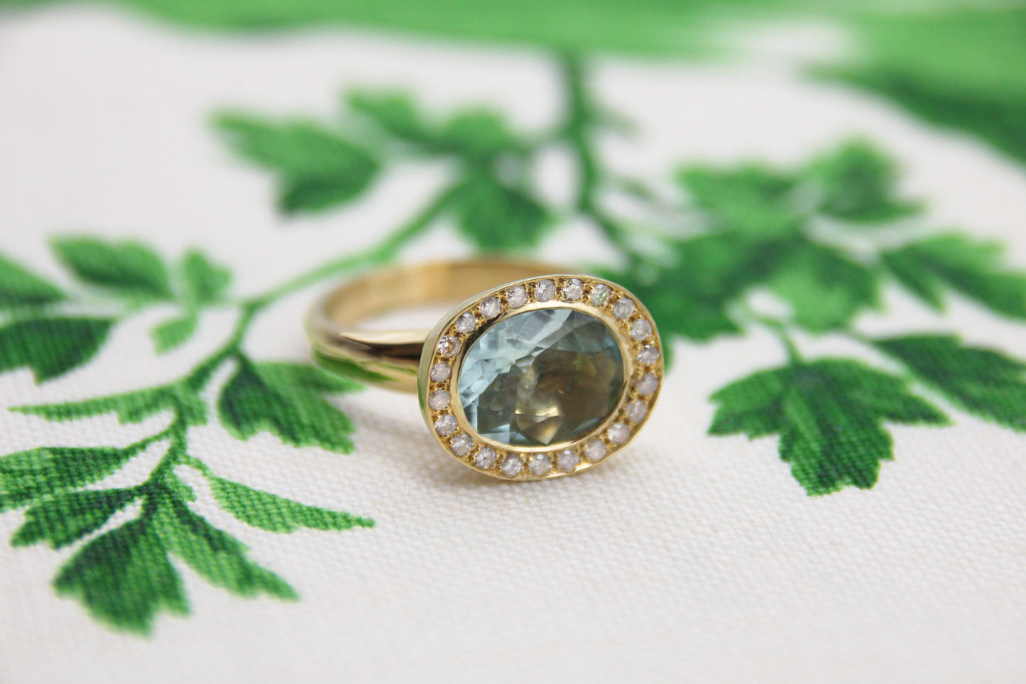 Aquamarine and Diamond Halo Ring